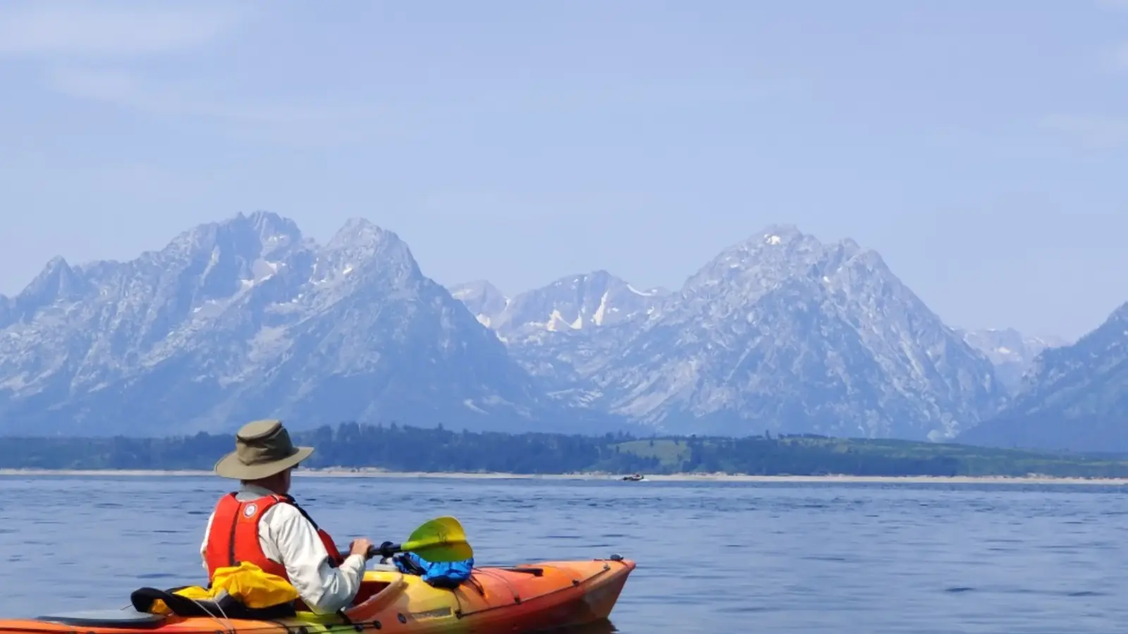 Scenic mountain lake at sunset in Jackson Hole.