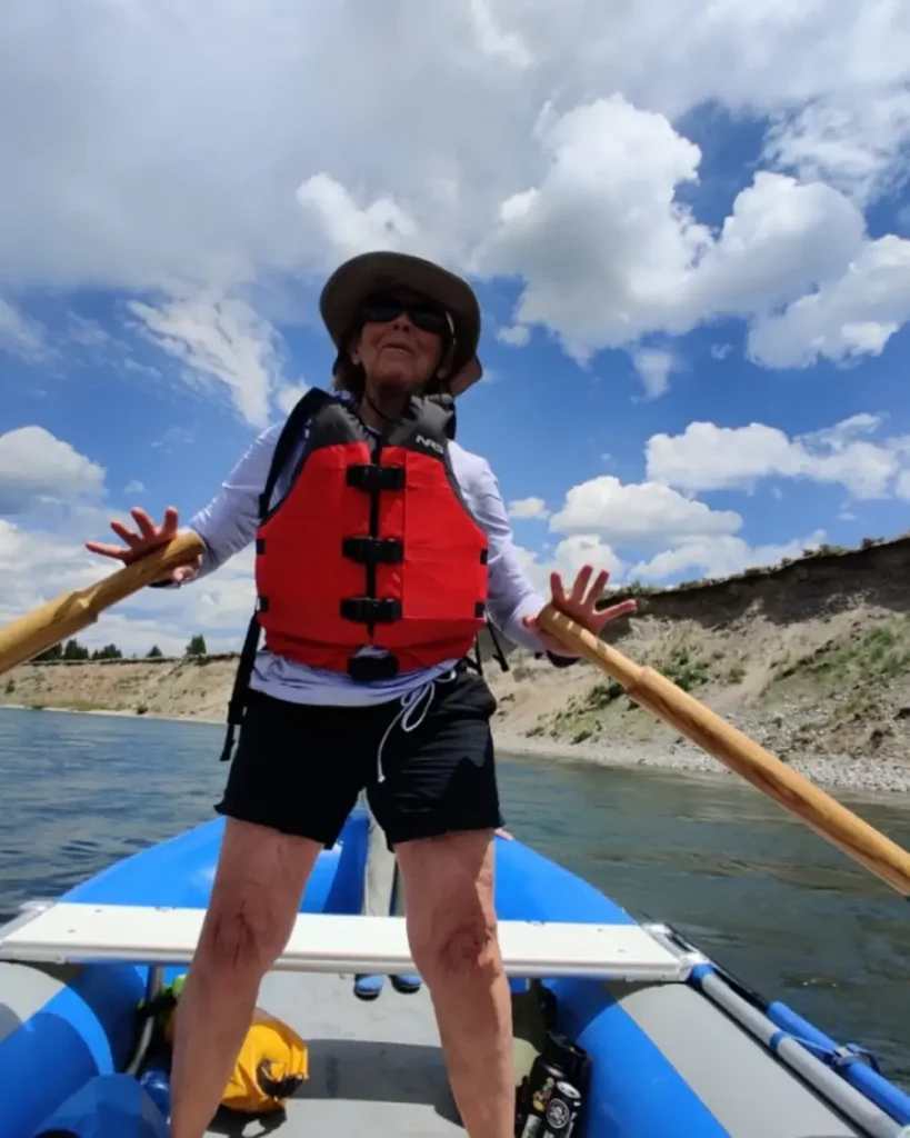 Person in white kayak and white water rapids in Jackson Hole.