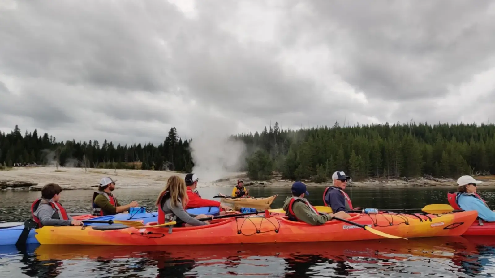 Person in red kayak and whitewater rapids in Yellowstone National Park.