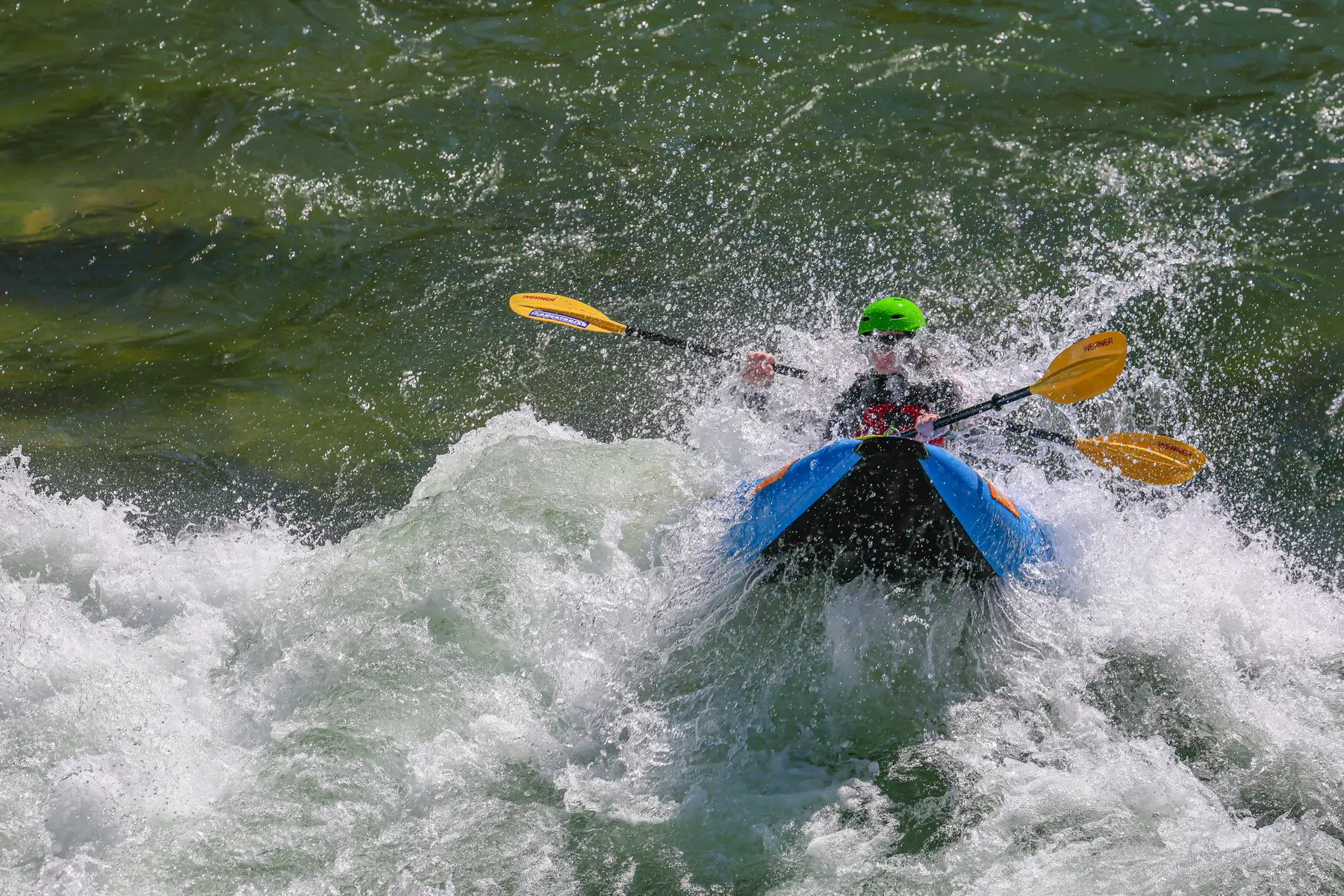 Ducky paddler in Jackson Hole whitewater